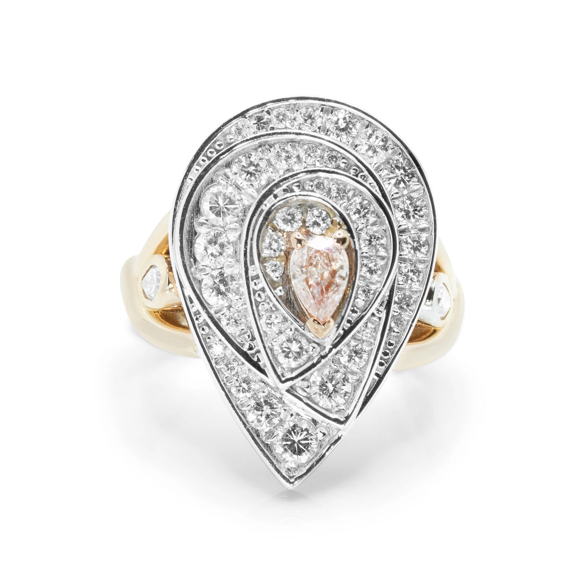 A top-down view of an 18ct rose gold Blush Teardrop ring featuring a 0.21ct fancy light purplish pink pear-cut diamond surrounded by a brilliant white diamond halo.