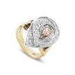 Perspective view of a rose gold statement ring showing the teardrop diamond cluster and the intricate split flared shoulders with bezel-set pear diamonds.