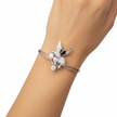 Emessa Diamond Bird & Floral Motif Bangle in 18ct White Gold worn on wrist
