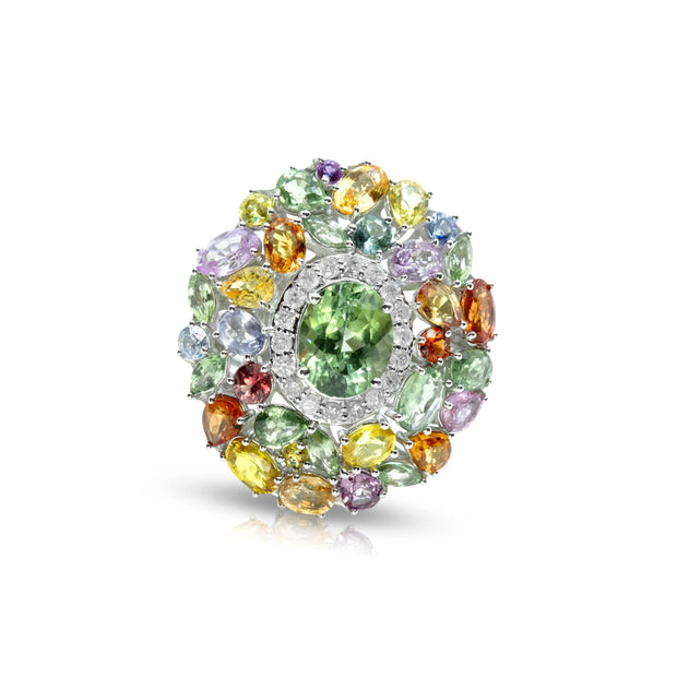Front view of the Emessa Aurora Garden cluster ring in 18ct yellow gold with an oval green tourmaline, diamonds and multi-coloured sapphires.