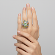 Emessa Aurora Garden green tourmaline cluster ring in 18ct yellow gold worn on hand.