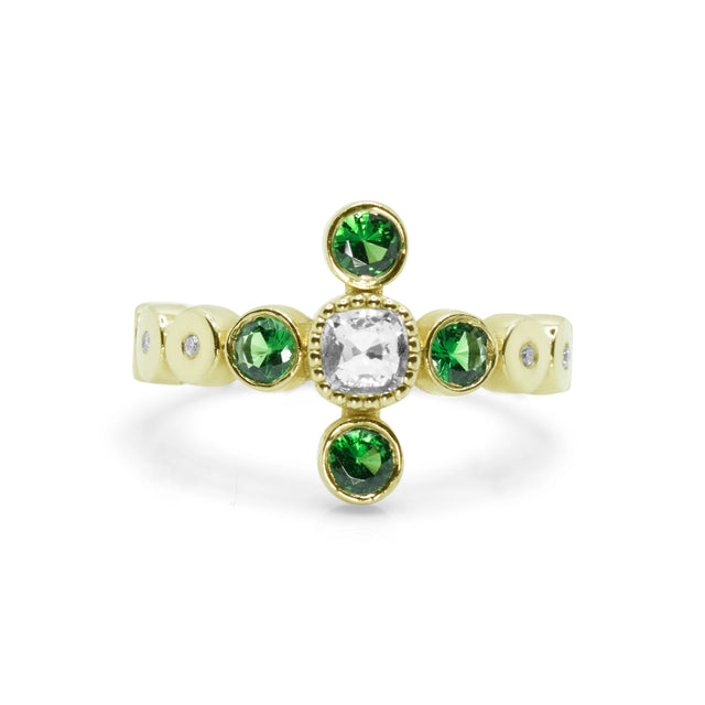 Front view of the Tsavorite Radiance ring with white sapphire and green tsavorite accents in 18ct white gold.