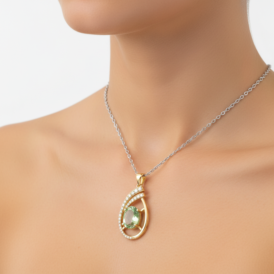 Golden Enchantment tourmaline and diamond teardrop pendant worn on neck, showcasing the vibrant 3.00ct oval tourmaline and sparkling diamonds.