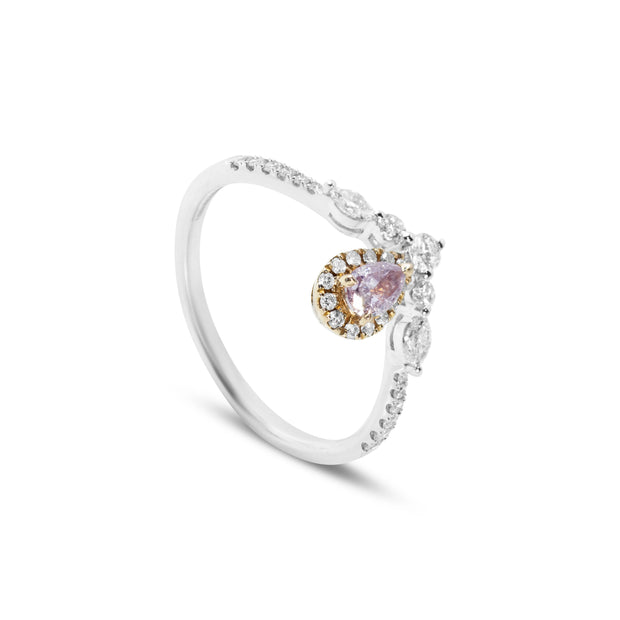 Angled view of 18ct yellow and white gold pear pink diamond ring with marquise and round brilliant-cut diamond accents in a teardrop cluster.