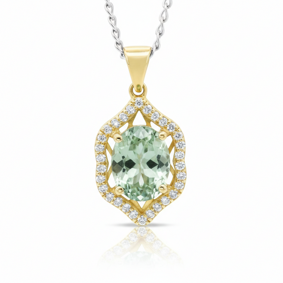 Front view of Olive Twilight pendant in 18ct yellow gold featuring a 3.04ct oval olive-grey tourmaline framed by a diamond-set lattice with 30 round brilliant-cut diamonds (0.24ct total).