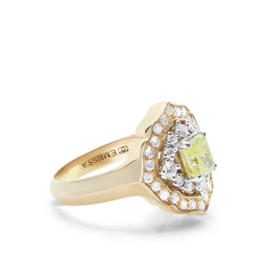 Side profile of a rose gold yellow diamond ring showing the sleek tapered band and the tiered setting of the yellow and pink diamonds.