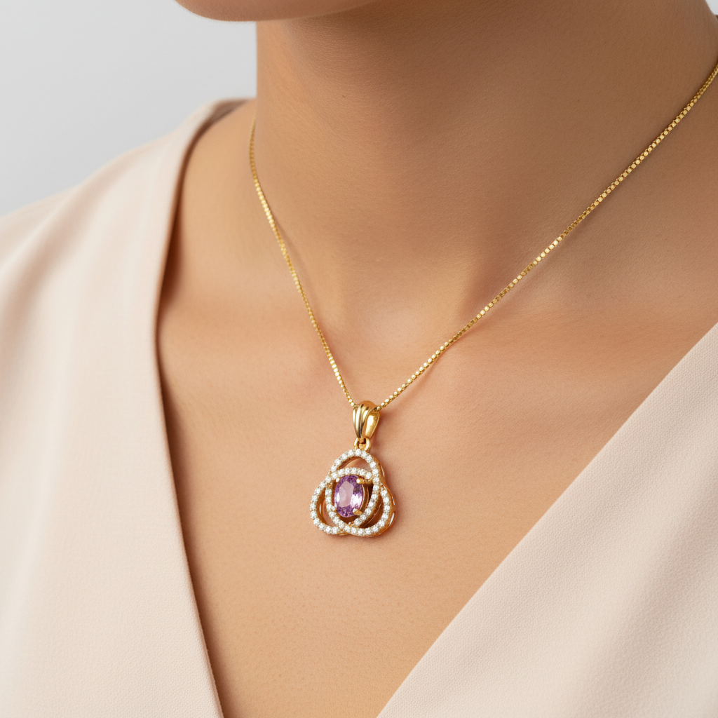 Rosé Radiance moissanite and diamond pendant worn on neck, showcasing the oval purplish-pink centre stone and sparkling diamond motif.