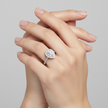 On hand: Ruby Arch pear diamond ring worn on hand, showing the elegant silhouette  in 18ct white gold.