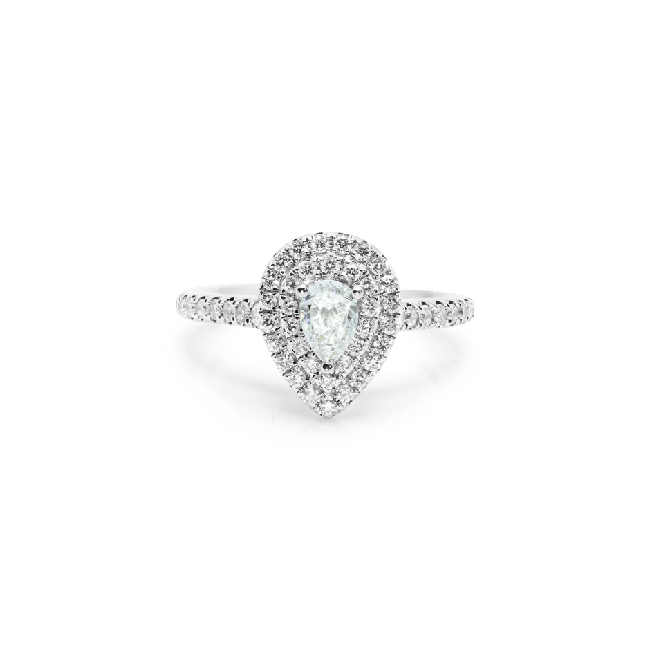 Front view of Ruby Arch ring in 18ct white gold featuring a pear-shaped natural diamond