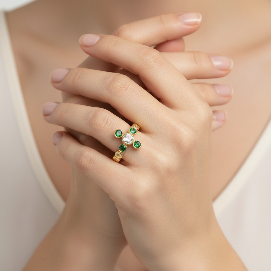 A model wearing the Tsavorite Radiance ring, showcasing the vivid green and white gemstone contrast on the hand.